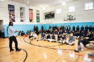 NFL cornerback Charles Tillman talks to UrbanPromise students in Camden