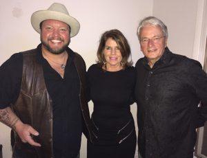 Singer Cliff Cody with concert hosts Jim and Pam Davis