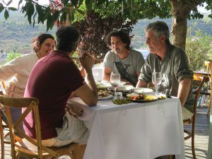 Bourdain eats with locals at a restaurant 20 minutes outside Jerusalem