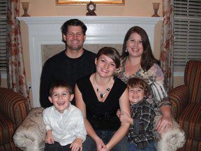 Cancer-free for four years, Davies and her husband Brad, son Evan, stepdaughter Brooke and son Kaelan celebrate Christmas in 2011 