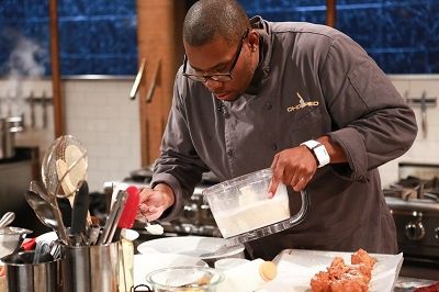 Chef Tim Witcher begins plating his food, as seen on Food Network's Chopped